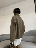 Poshoot Paride Turtleneck Cashmere Sweater